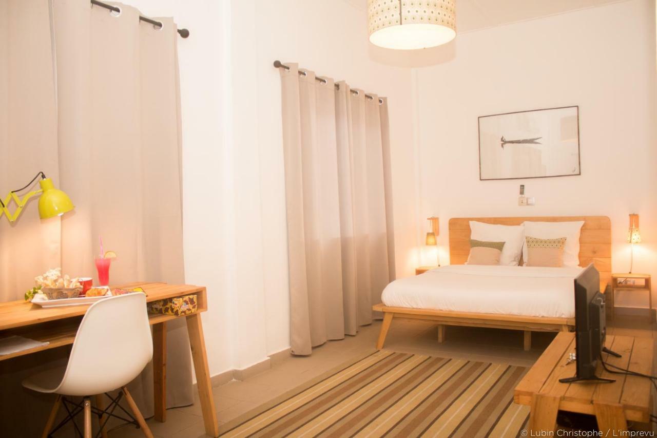 L'Imprevu Hotel Cotonou Bagian luar foto